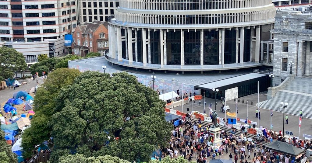 Coronavirus vaccine protesters in New Zealand defy police alert to leave Parliament