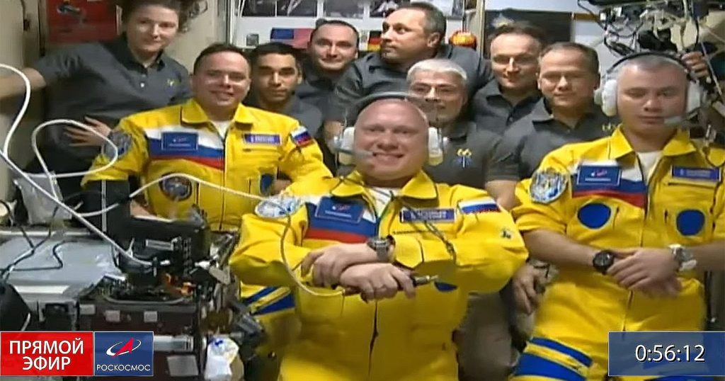 Russian cosmonauts arrive at the International Space Station in the colors of the Ukrainian flag