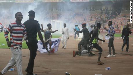 Fans flock to the pitch as Ghana beat Nigeria to the World Cup berth