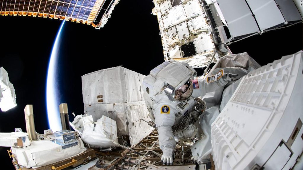 NASA astronauts do spacewalks to provide space station power upgrades
