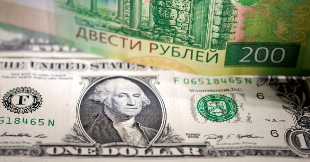 The Russian ruble fell to new lows after the credit rating downgrade
