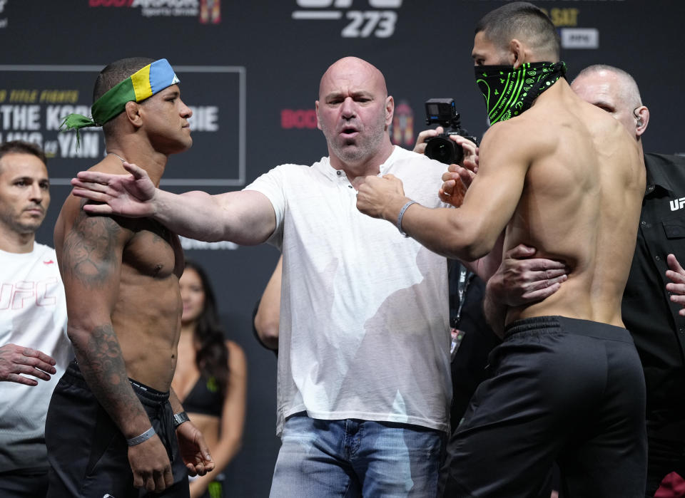 JACKSONVILLE, FL - APRIL 8: (From left to right) antagonists Gilbert Burns of Brazil and Khamees Shemayev of Russia face off during UFC 273 celebration at the VyStar Veterans Memorial Arena on April 8, 2022 in Jacksonville, Florida.  (Photo by Jeff Buttari/Zuffa LLC)