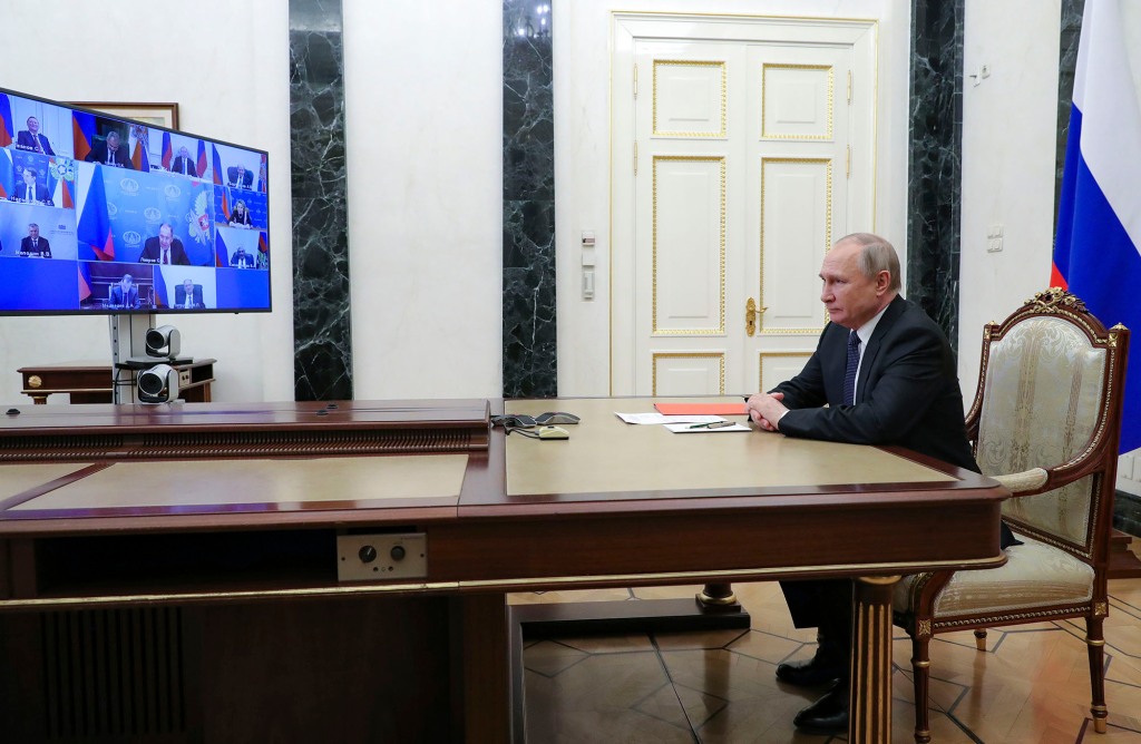 Russian President Vladimir Putin chairs a meeting with members of the Security Council via video conference at the Kremlin in Moscow, Russia, Friday, April 29, 2022.