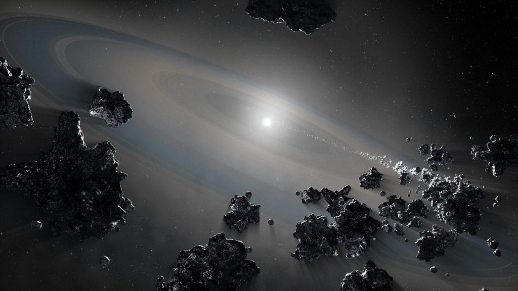 A dead star caught violently tearing apart the planetary system