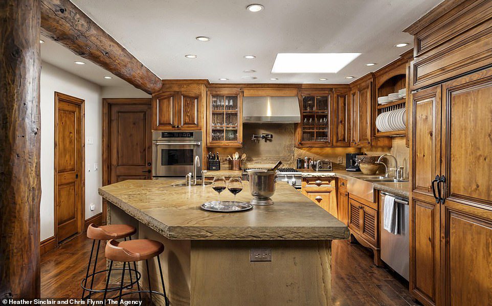 What is cooking?  The kitchen of the house is completely enclosed in wood and offers plenty of storage space and an island table
