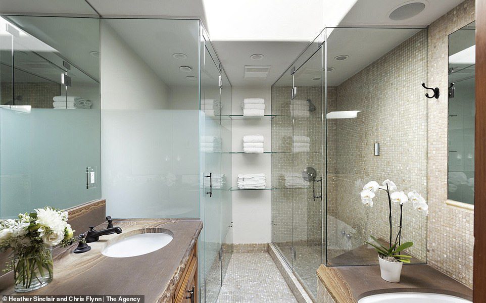 R&R: The house also has four and a half bathrooms, including this elegant space