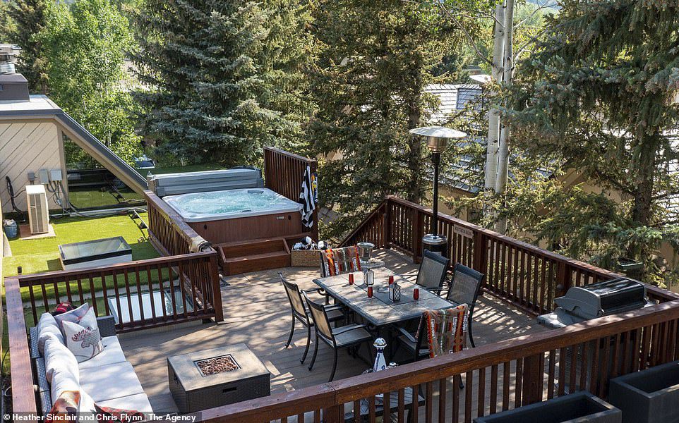 Life on the deck!  Future residents can enjoy the views from the hot tub