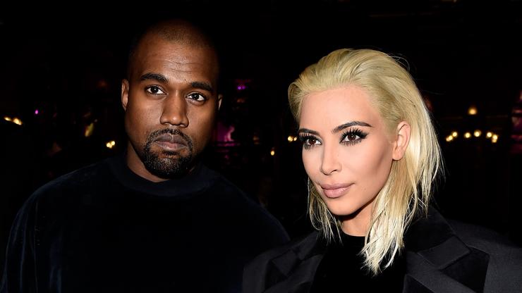 Kim Kardashian and Kanye West attend a basketball game in the North together