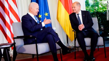 German Chancellor Olaf Schultz, right, welcomes US President Joe Biden, left, at a bilateral meeting at Elmau Castle in Kruen, near Garmisch-Partenkirchen, Germany, on Sunday, June 26, 2022. 