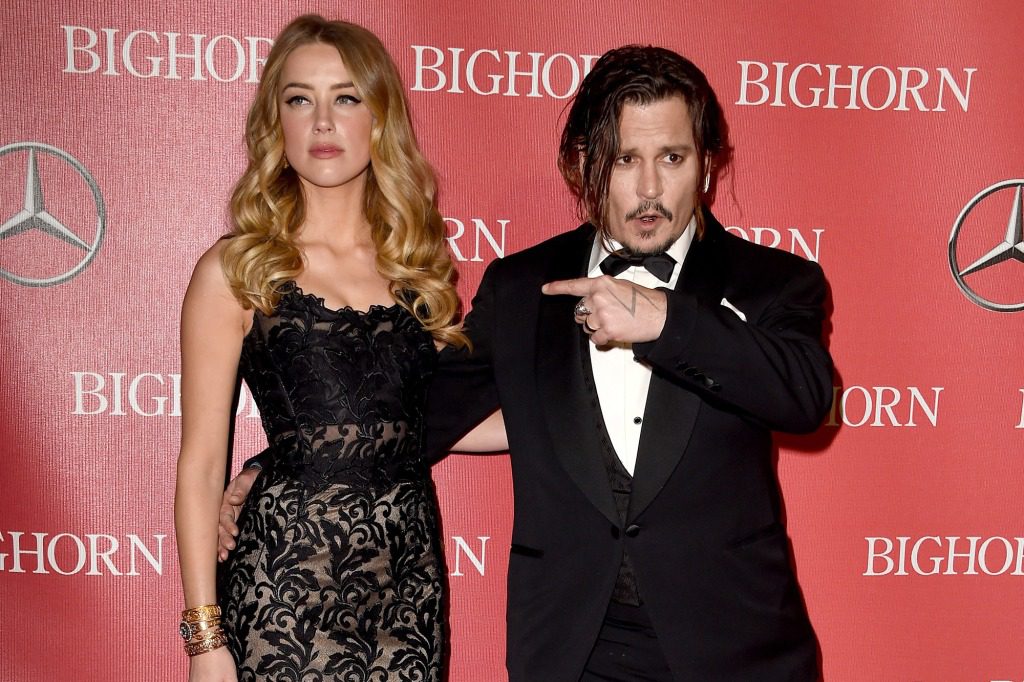 Actors Amber Heard (left) and Johnny Depp attend the 27th Annual Palm Springs International Film Festival Awards Ceremony at the Palm Springs Convention Center on January 2, 2016 in Palm Springs, California.  
