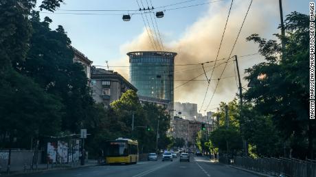 Smoke rises after a Russian air strike on the Shevchenkivsky district of Kyiv on June 26, 2022. 