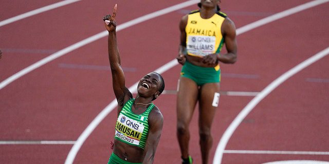 Nigeria's Toby Amosan celebrates winning the women's 100m hurdles final at the World Athletics Championships on Sunday, July 24, 2022 in Eugene, Oregon.