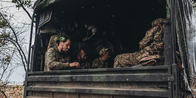 DONBAS, Ukraine - JULY 23: Ukrainian soldiers in a truck on the Donbass front line Donetsk (Ukraine), July 23, 2022.