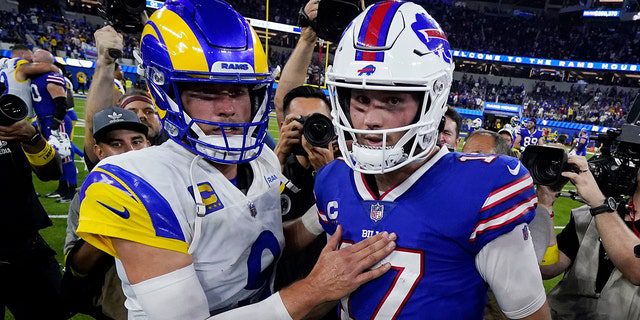 Los Angeles Rams quarterback Matthew Stafford (9) and Buffalo Bills quarterback Josh Allen (17) meet in the middle of the field after an NFL football game Thursday, September 8, 2022, in Englewood, California.