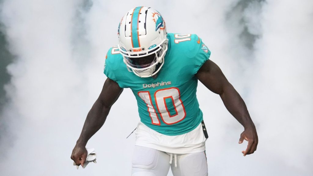 Upbeat Dolphins play Trek Hill against the Vikings . Source says