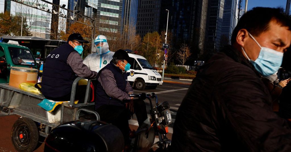 China's coronavirus cases are surging, and hard-hit areas of Beijing have closed schools